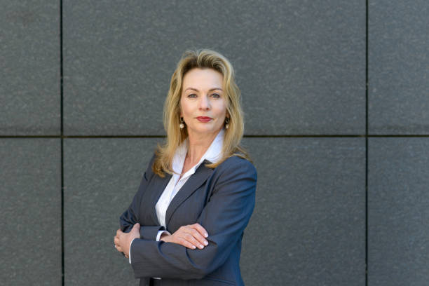 istock Confident smart businesswoman with folded arms 1133335798