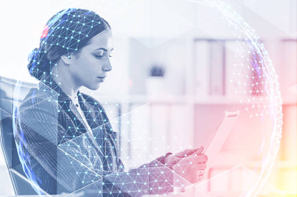 istock Serious woman with tablet, planet hologram 1133337302