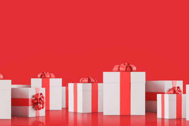 istock White and red presents on red background 1133338488