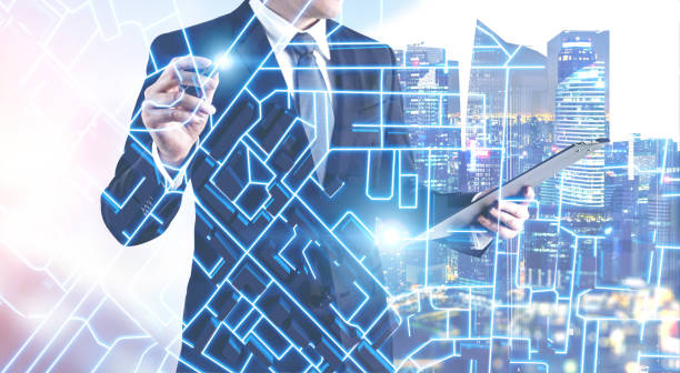 istock Businessman drawing city plan 1133338579