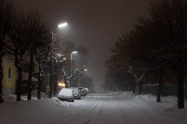 istock snowy night street 1133346326