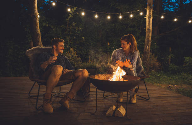 istock Fireplace at porch and summer night 1133359008