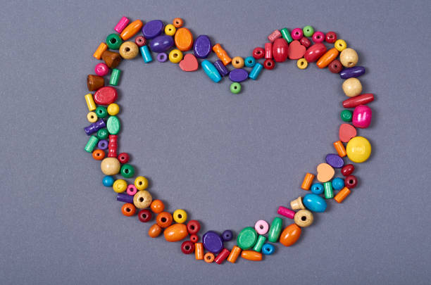 istock Wooden color beads composition. Needlework concept background. Flat lay 1133362047
