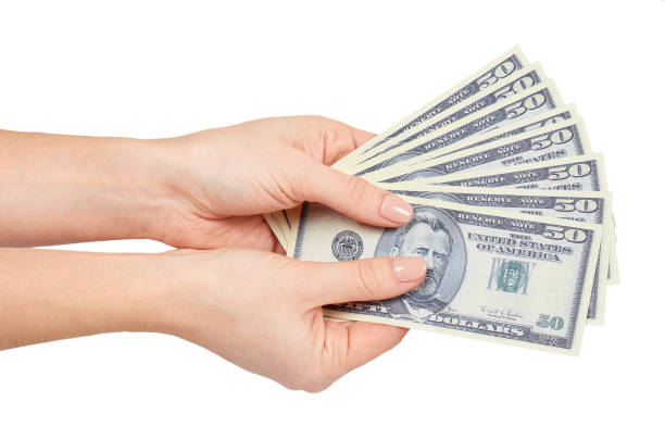 istock Hand with US dollars, concept of bribes and corruption. 1133362099