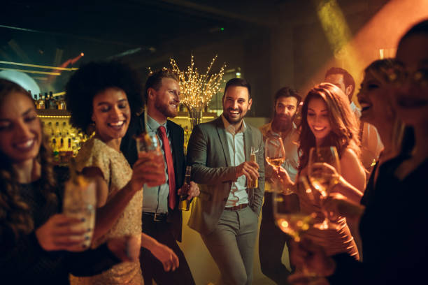I'm having the best time with you guys! Group of friends partying at the nightclub holiday event photos stock pictures, royalty-free photos & images