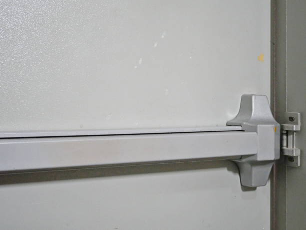 istock Closed up latch and rusty door handle of emergency 1133364861