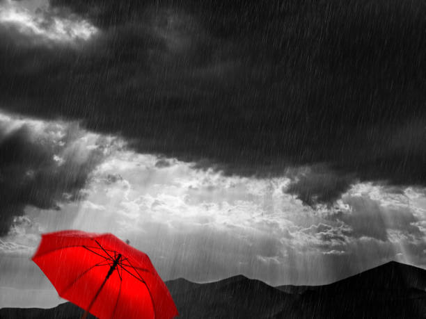 istock Red umbrella and rainy-sunny weather in Greece 1133368033