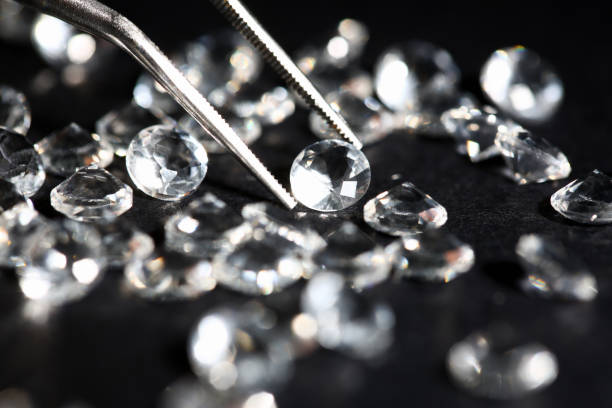scattering of white star diamonds on black - fake jewelry imagens e fotografias de stock