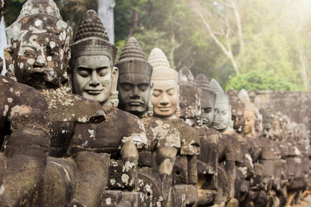 istock Ancient Angkor Thom stone gate in Cambodia 1133369705