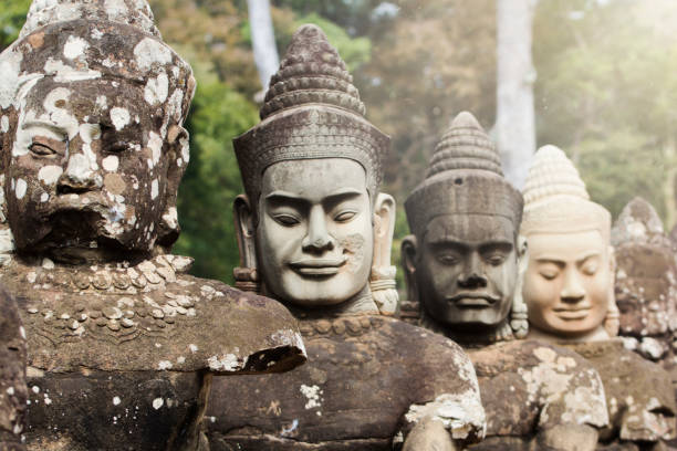 istock Ancient Angkor Thom stone gate in Cambodia 1133369799