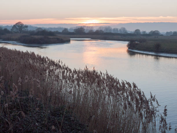 istock Beautiful countryside Dedham water scene outside nature landscape space 1133369949