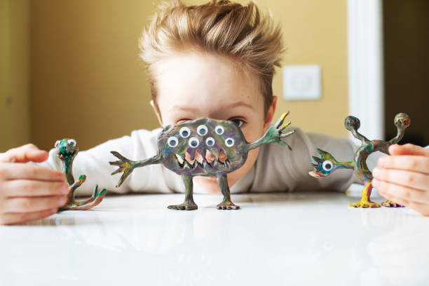 istock Little boy playing with Child's Play Clay 1133371284