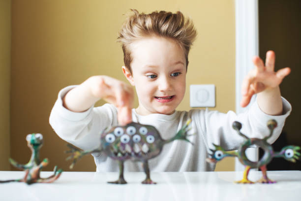 istock Little boy playing with Child's Play Clay 1133371286