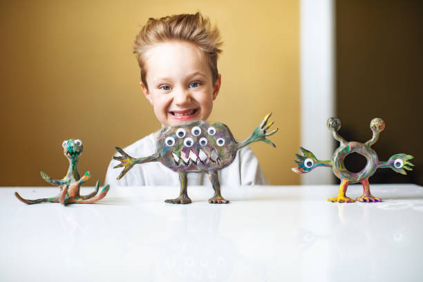 istock Little boy playing with Child's Play Clay 1133371287