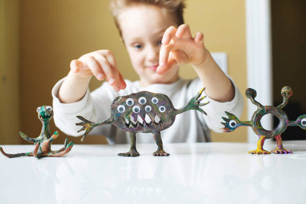 istock Little boy playing with Child's Play Clay 1133371288