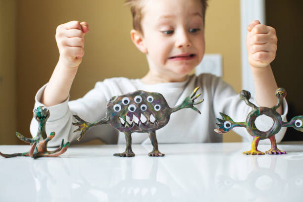 istock Little boy playing with Child's Play Clay 1133371292