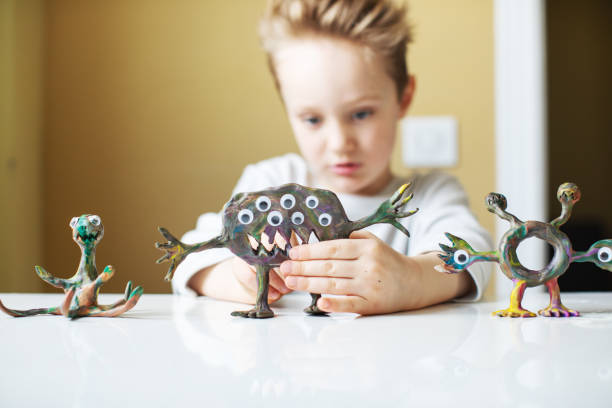 istock Little boy playing with Child's Play Clay 1133371312