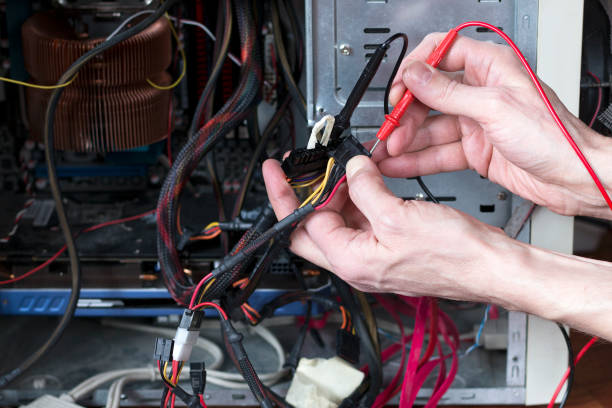 istock Man is testing the electrical power of power supply. 1133373090