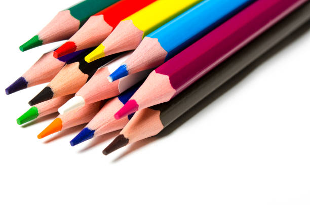 白い背景に色鮮やかな鋭い鉛筆が横たわっている - pencil office supply yellow sharp ストックフォトと画像