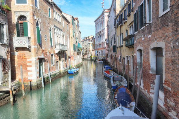 istock boats on lateral narrow Canal 1133377697