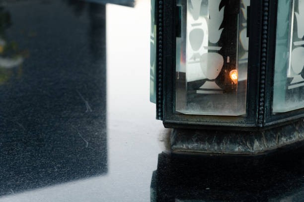 istock Flowers, candles, lights on the graves and tombs. 1133378025