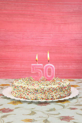 Birthday cake with number 50 candle for her birthday