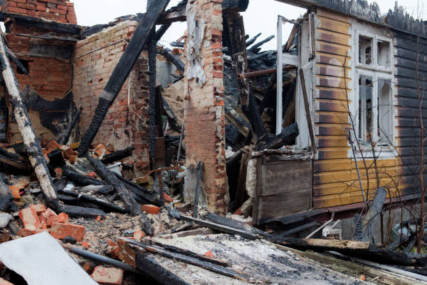 istock Burnt old wooden house 1133379537