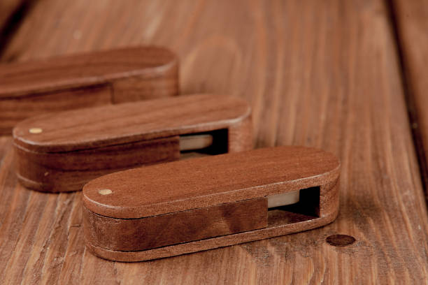 istock wooden usb flash drive on wooden desk 1133381948