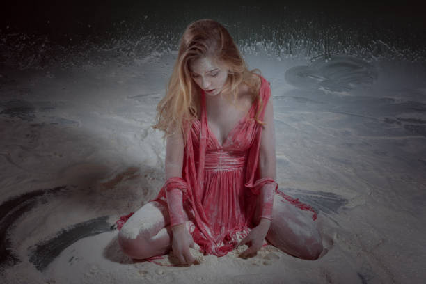 istock Woman on the floor in flour. 1133383080
