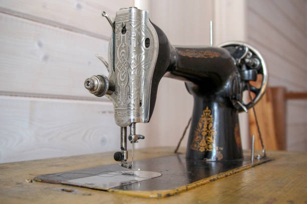 istock Beautiful retro sewing machine for textile design. Vintage light backdrop. Line art textile design 1133384499