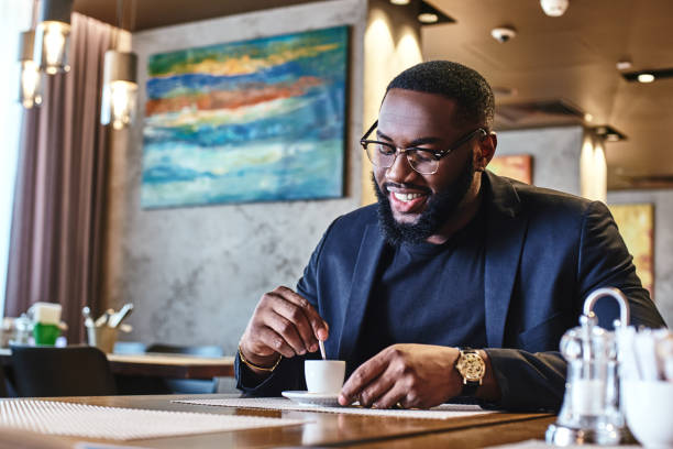 istock Never trust anyone who doesn't drink coffee. Young businessman came into the restaurant for lunch 1133385395
