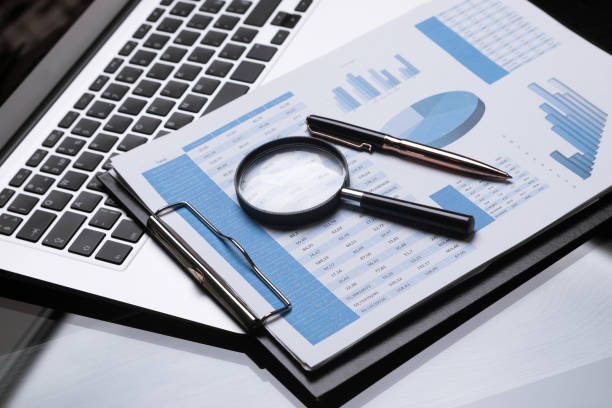 Office workplace with magnifier and stationery