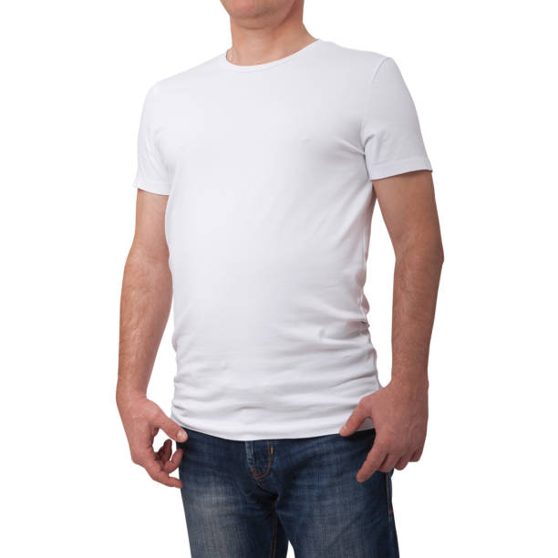 istock Man wearing blank blue t-shirt on gray brick wall background with copy space. Front view 1133387138