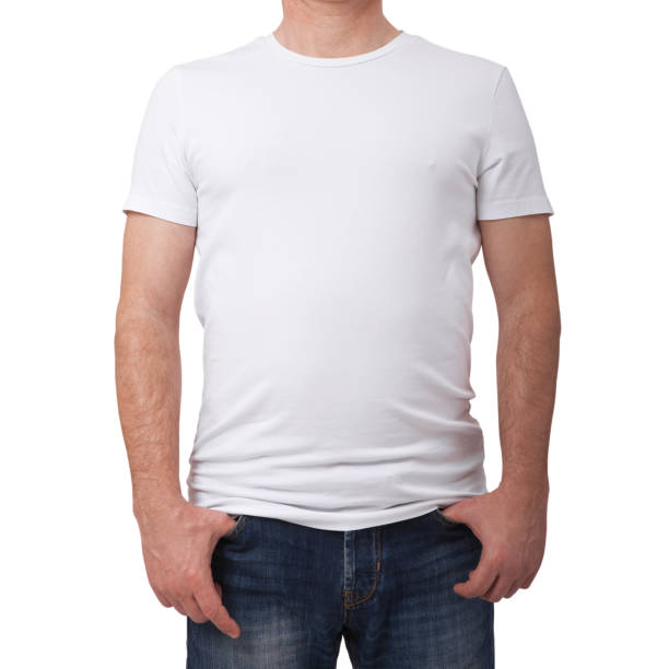 istock Man wearing blank blue t-shirt on gray brick wall background with copy space. Front view 1133387145
