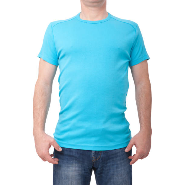 istock Man wearing blank blue t-shirt isolated on white background with copy space. Tshirt design and people concept - close up of men in blank shirt. Front view 1133387150