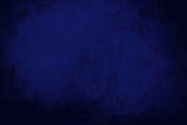 istock dark blue grungy background or texture 1133390402