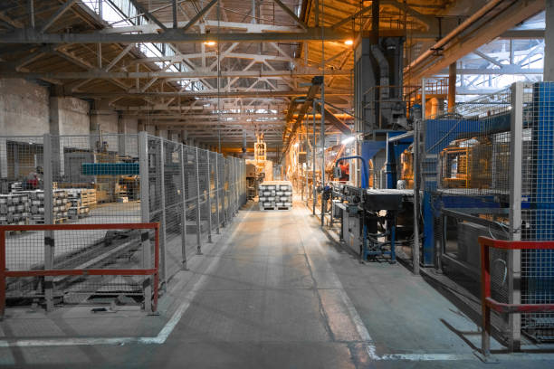 istock Long dusty corridors inside the ceramic factory 1133394430