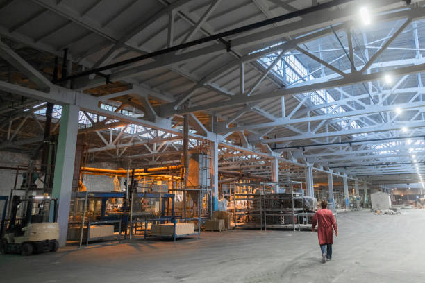 istock Workers perform their tasks in the shop production plant 1133394431
