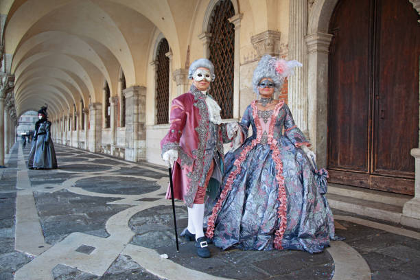 Venice, Italy - February 5, 2008: Unidentified person with Venetian carnival mask in Venice, Italy. At 2008 it is held from January 26th to February 5th.