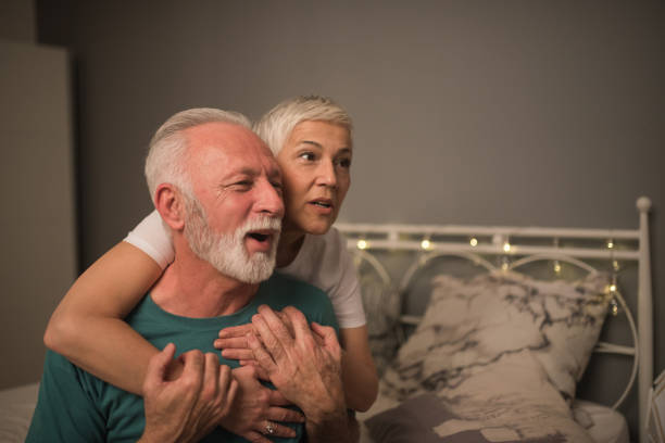 istock Woman hugging her husband 1133403923