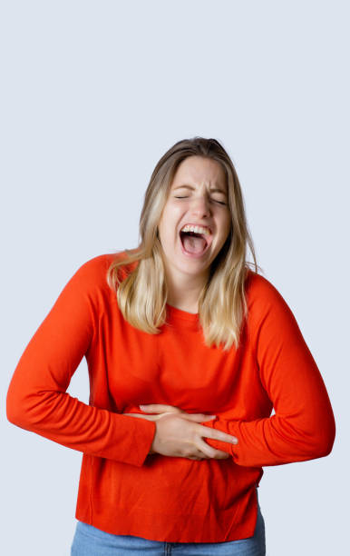 istock Young woman laughing. 1133404174