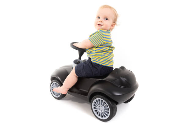 istock Child sitting on a gurney isolated on white background 1133405477
