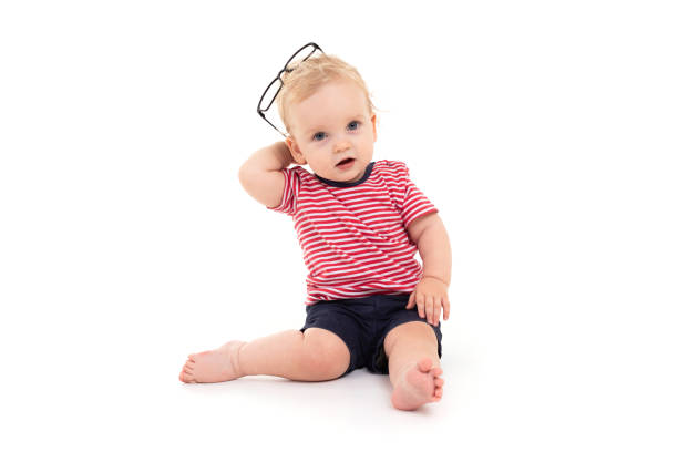 istock Child wearing head glasses isolated on white background 1133405483