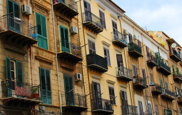 istock Typical 19th century Palermo marble balconies with wrought iron support brackets 1133406125