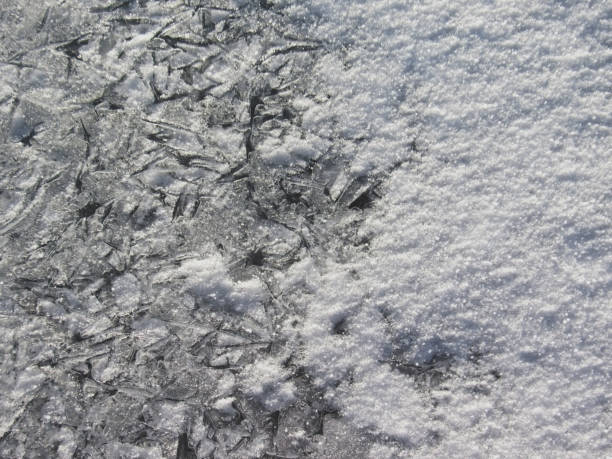 Winter pattern design made by nature: Surface of the frozen ice, covered with frosty ice patterns Ice and snow texture, winter background: The texture of the ice crystals covered under powder snow crust with space for text for winter design crud stock pictures, royalty-free photos & images