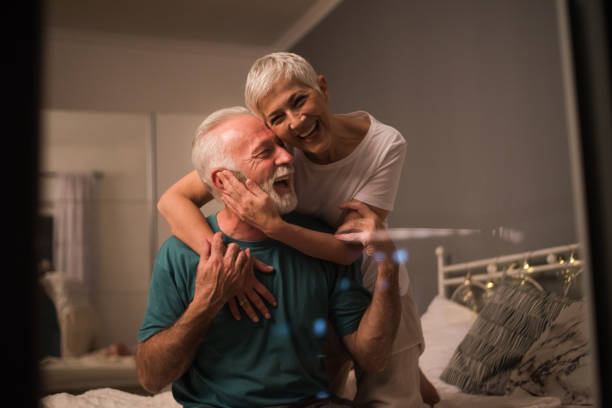 istock Woman hugging her husband 1133409084