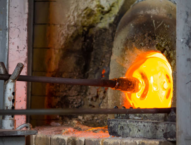 istock Glass blowing process in the factory 1133409937