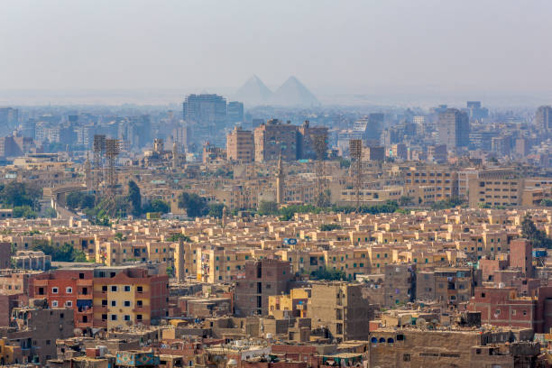 Pyramids silhouettes over Cairo, Egypt Pyramid, Pyramid Shape, Smog, Famous Place, Urban Skyline egypt skyline stock pictures, royalty-free photos & images