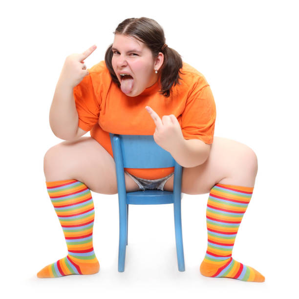 Obese Teenage Girl Making Grimace On A White Background Stock Photo -  Download Image Now - iStock
