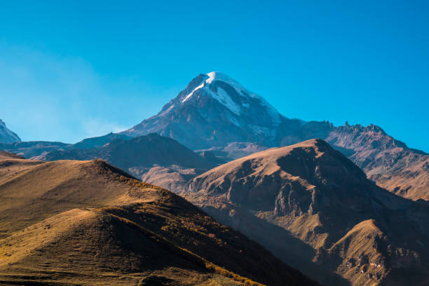 istock Mount Kazbek (Mkinvartsveri) at sunny day. Caucasus mountains 1133417351